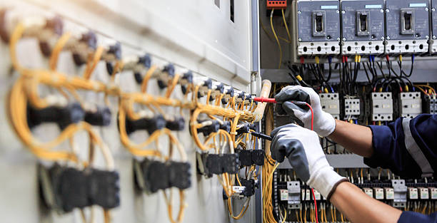 Professional Electrician technician working in Bentonville, AR